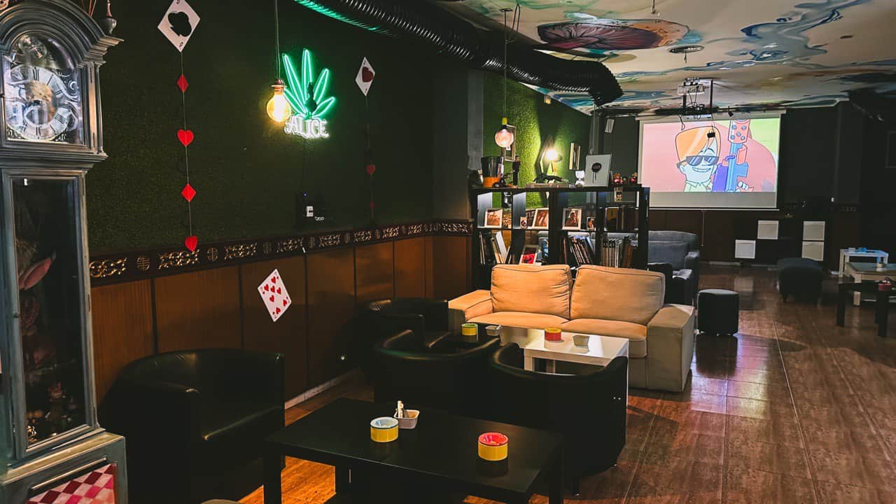 Entertainment space with a projector at the Alice cannabis association in Valencia, Spain