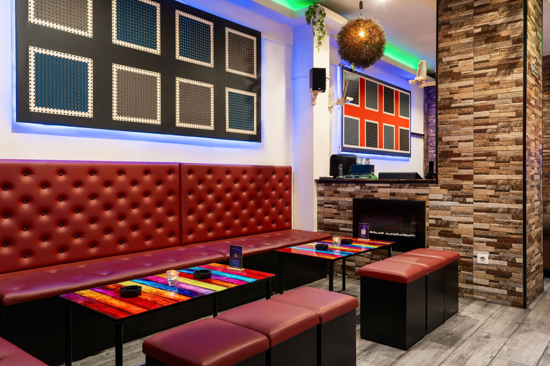 Lounge of the cannabis association Smoke Signals in Barcelona with neon lighting